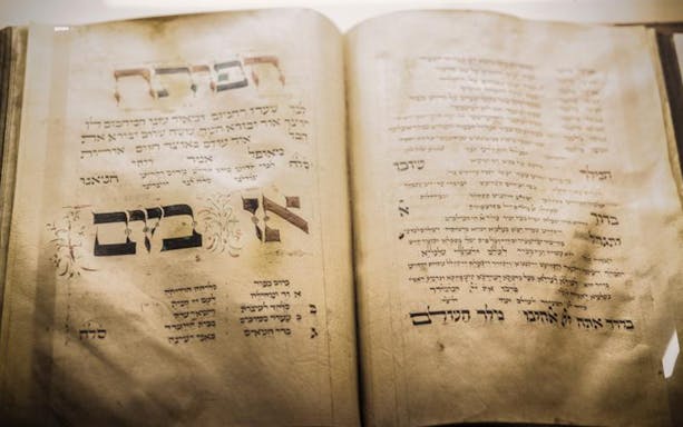 Ancient Hebrew text in a book from the Prague Jewish Quarter tour.