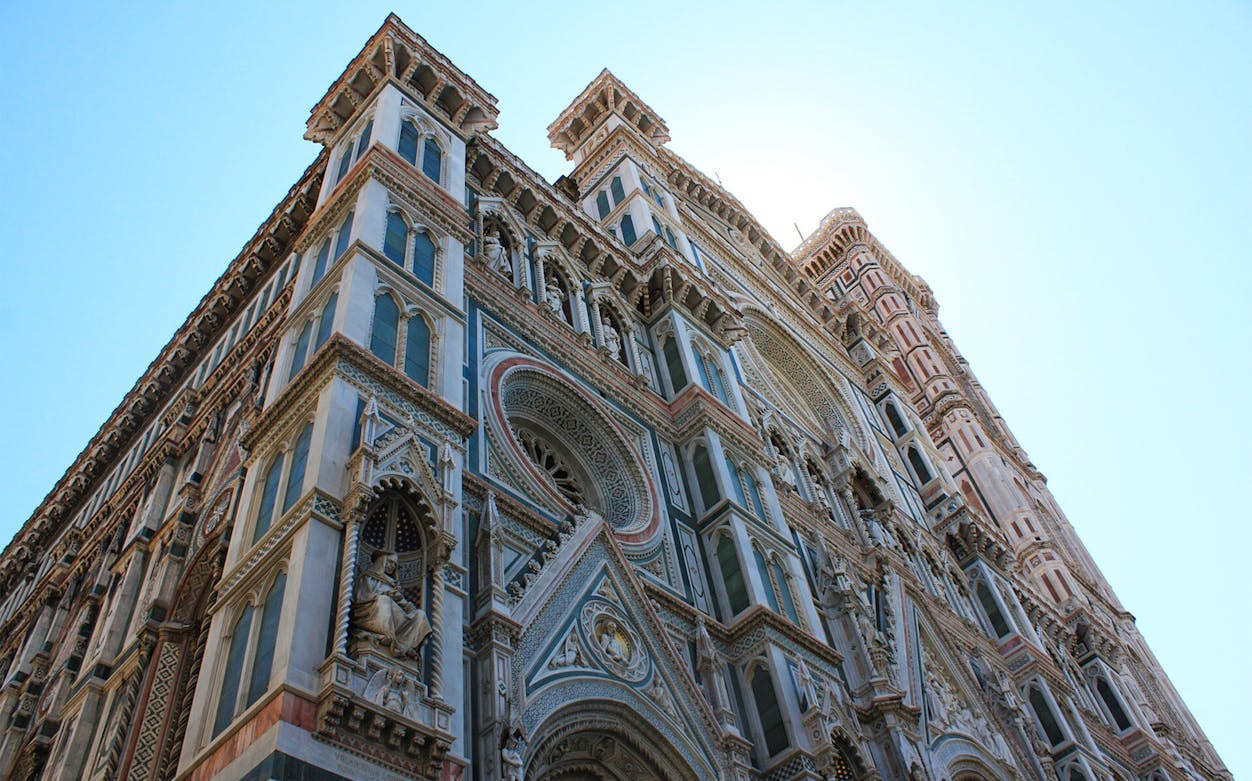 Santa Croce Basilica facade in Florence, Italy, viewed from below.