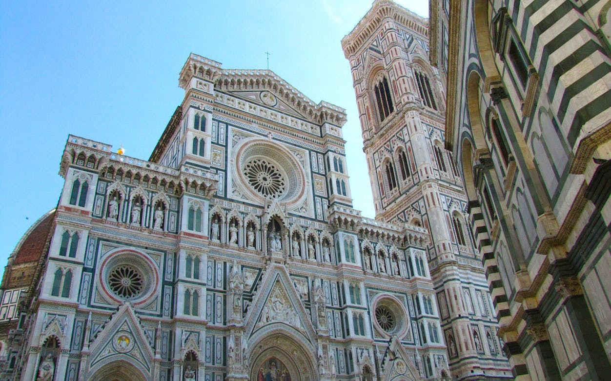 Santa Maria del Fiore facade and bell tower in Florence, Italy.