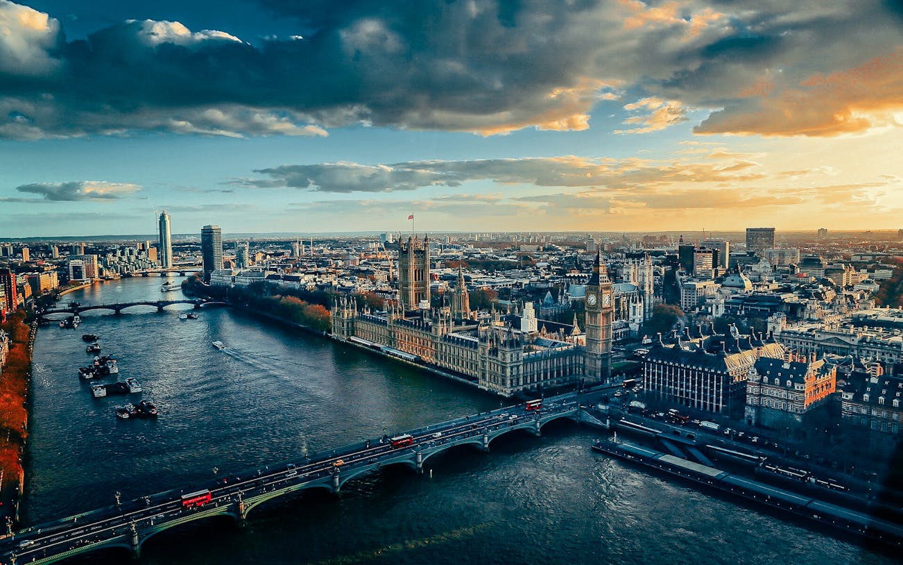 Aerial view of the Houses of Parliament and Big Ben along the River Thames in London.