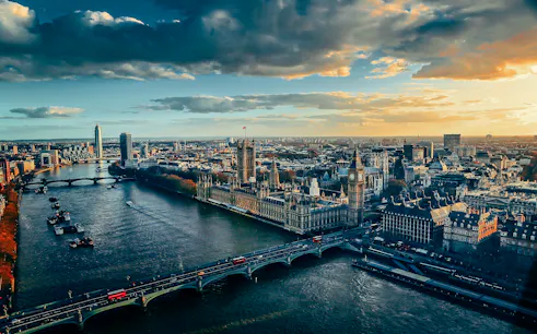 Aerial view of the Houses of Parliament and Big Ben along the River Thames in London.