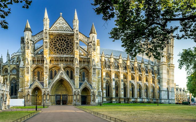 Westminster Abbey exterior with intricate Gothic architecture, London.