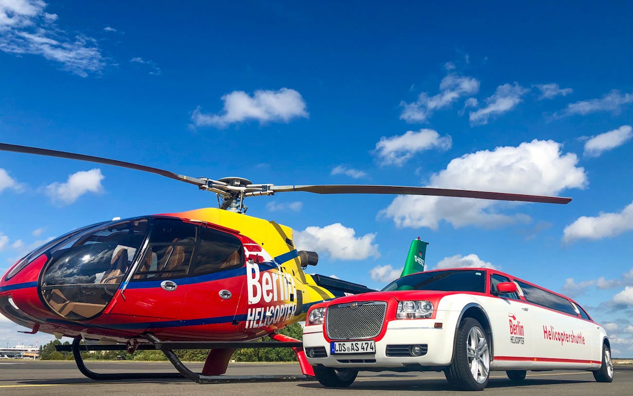 Helicopter and limousine for Berlin Skyline Rundflug tour on a sunny day.