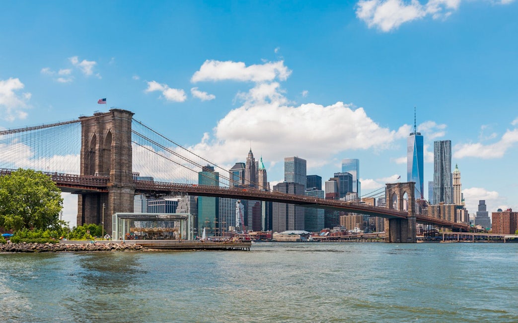 Brooklyn Bridge and Manhattan skyline on a sunny day, New York Self Guided Audio Tour.