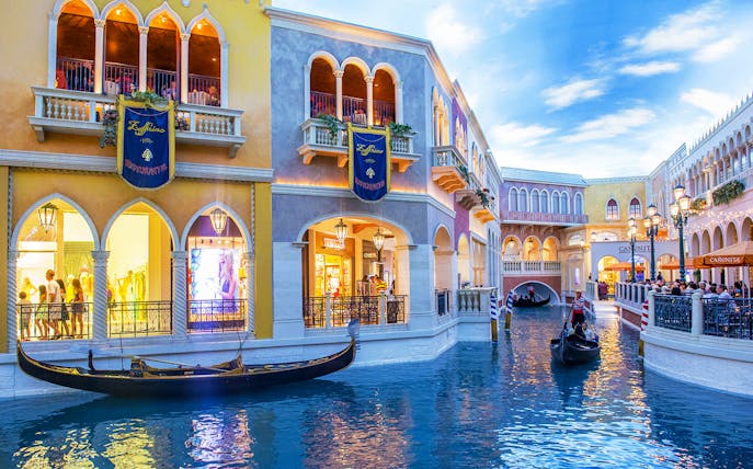 Gondola ride through Venetian-style canal in Las Vegas.