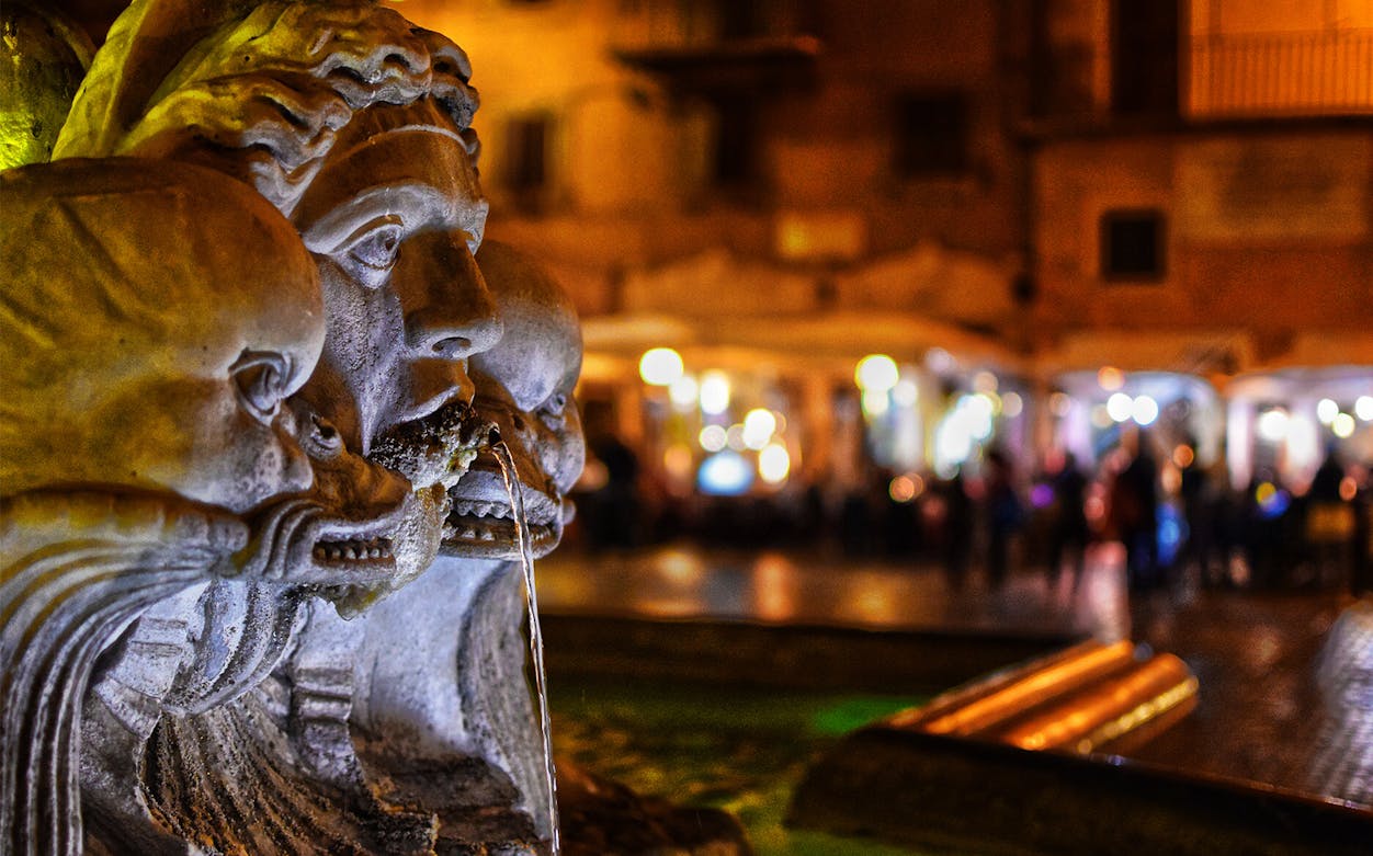 Fountain detail at Piazza Navona during a self-guided audio tour in Rome.