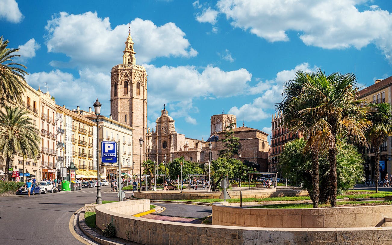 Valencia Cathedral and Plaza de la Reina on a sunny day, part of self-guided audio tour.