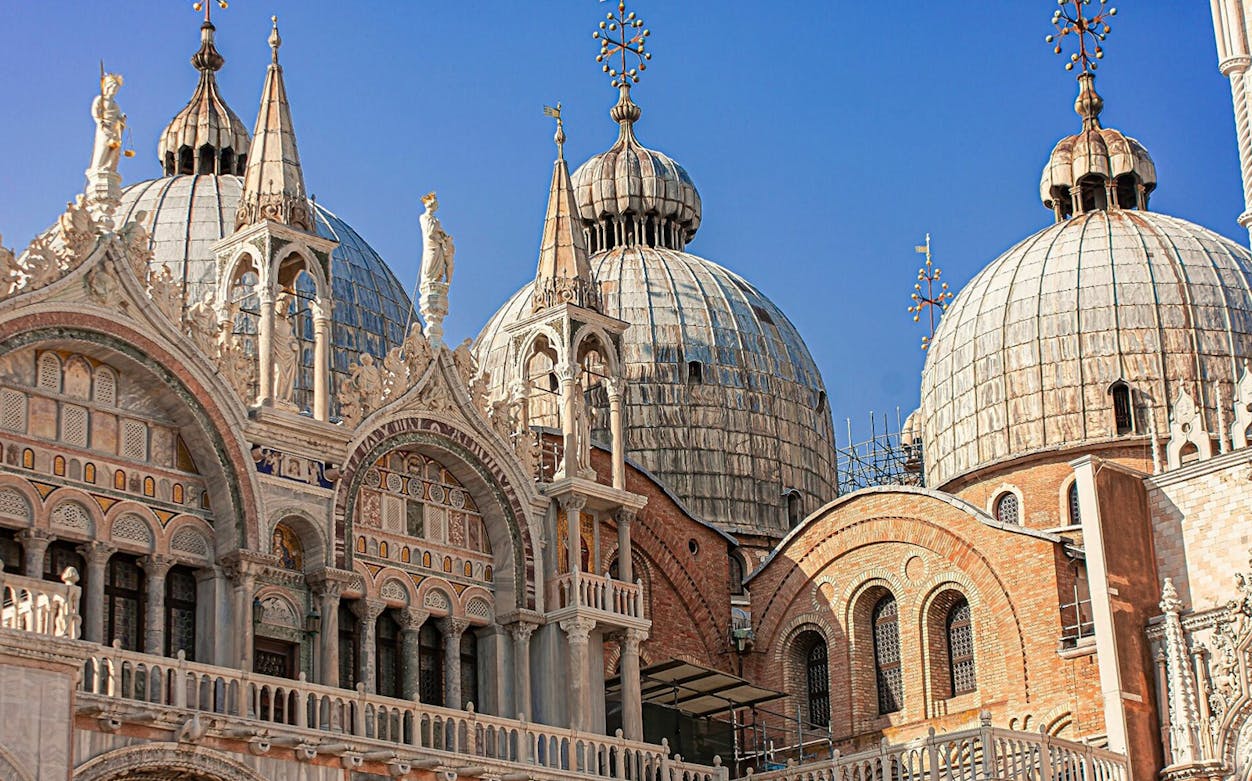 Saint Mark's Cathedral domes and facade in Venice, Italy, viewed during a self-guided audio tour.