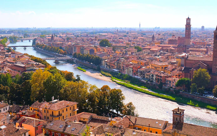 Aerial view of Verona with the Adige River and historic buildings, Italy.