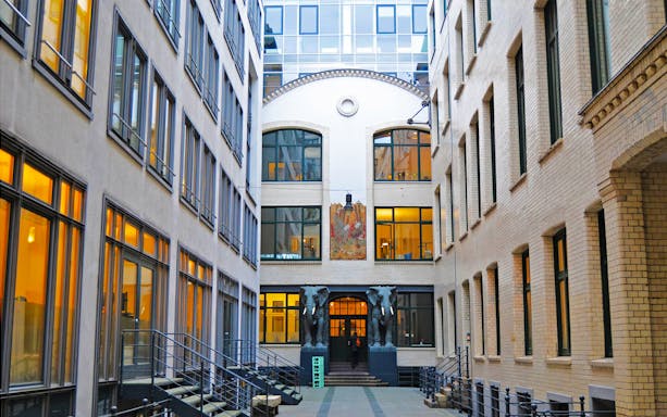 Courtyard with elephant statues in historic Hamburg building.