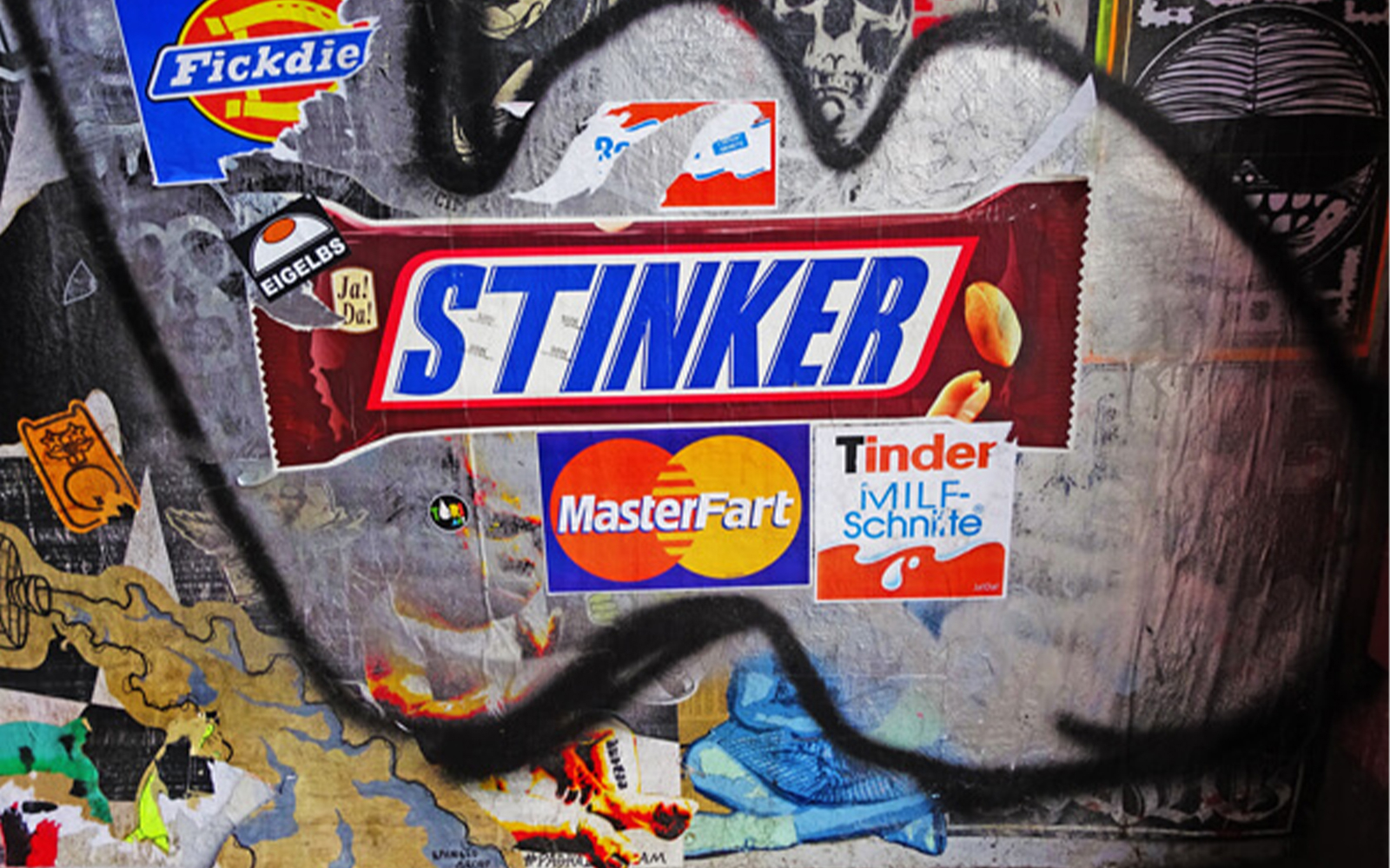 Street art collage with parody brand stickers in Sternschanze, Hamburg.