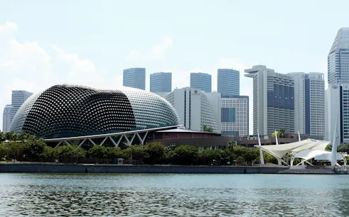 Esplanade Theatres by the Bay with Singapore skyline in the background.