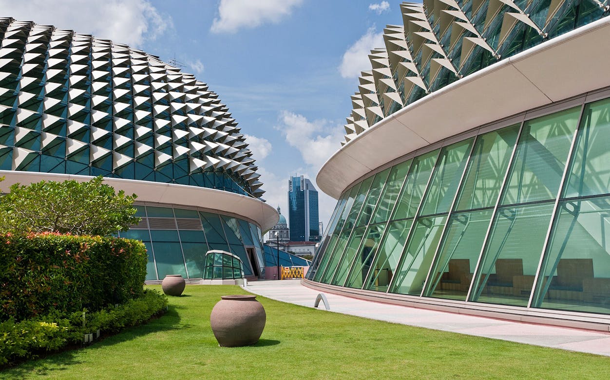 Esplanade's unique architecture in Singapore with city skyline in the background.