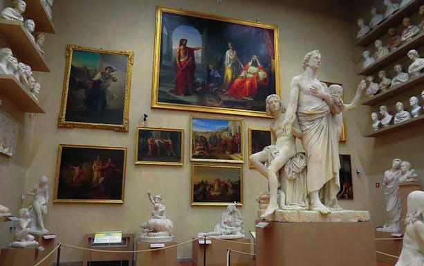 Sculptures and paintings in Accademia Gallery, Florence, Italy.