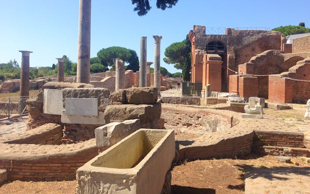 Ancient ruins and columns at Ostia Archaeological Park, Italy.
