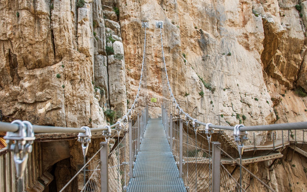 Suspension bridge on Caminito del Rey trail in Málaga, Spain.