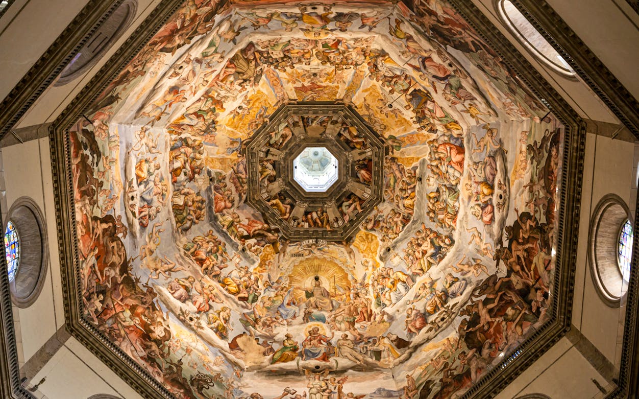 Frescoes inside Brunelleschi’s Dome, Florence, depicting religious scenes.