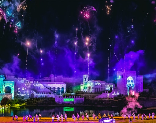 Performers with firecrackers at Toledo night show, Puy du Fou España, Madrid.