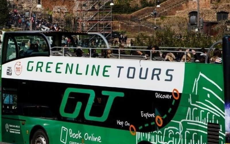 Open-top tour bus in Rome with Greenline Tours branding.