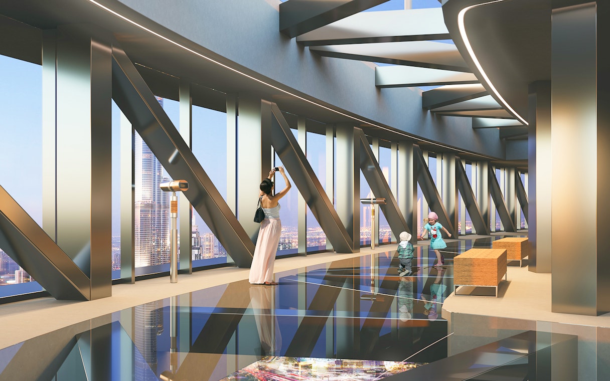 Sky Views Dubai observation deck with visitors enjoying city views.