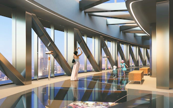 Sky Views Dubai observation deck with visitors enjoying city views.