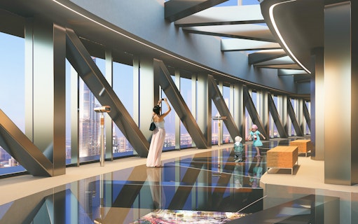 Sky Views Dubai observation deck with visitors enjoying city views.