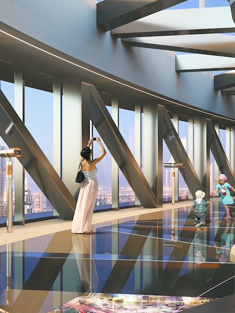 Sky Views Dubai observation deck with visitors enjoying city views.