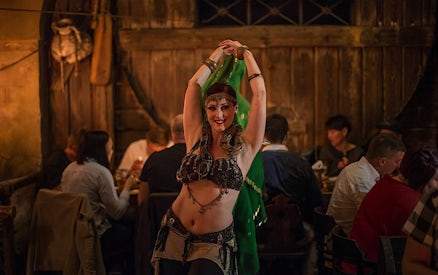Dancer performing at a medieval-themed New Year's Eve dinner.