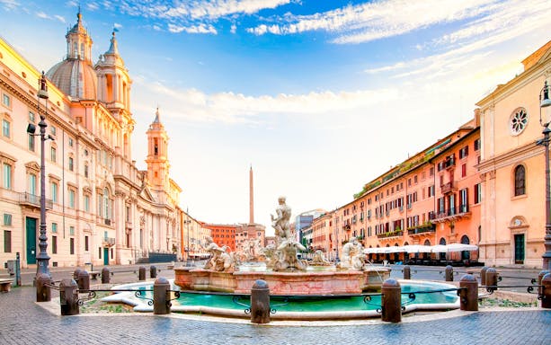 Piazza Navona with Fountain of Neptune in Rome during a guided walking tour.