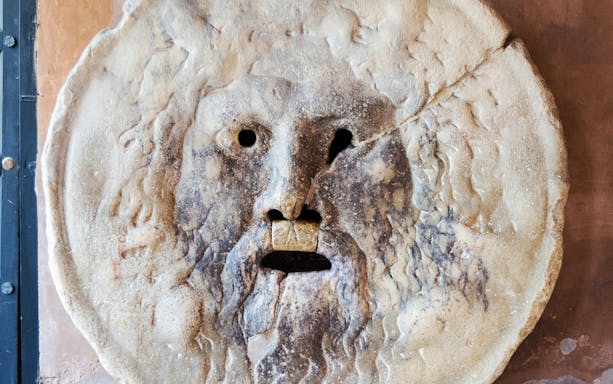 Bocca della Verità sculpture in Rome's Velabrum area.