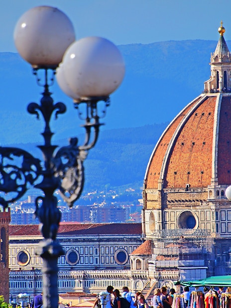 Florence Duomo and Brunelleschi's Dome with cityscape in the background.