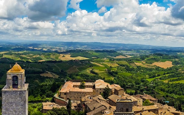 San Gimignano towers and Chianti vineyards on small-group tour from Florence.