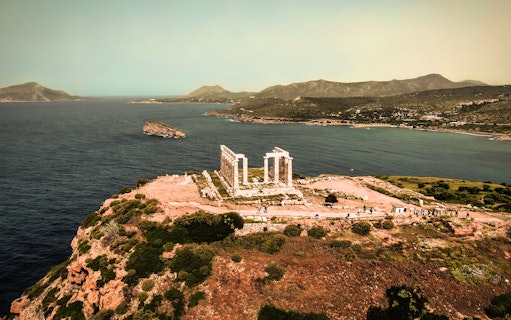 Temple of Poseidon at Cape Sounion overlooking the Aegean Sea, Greece.