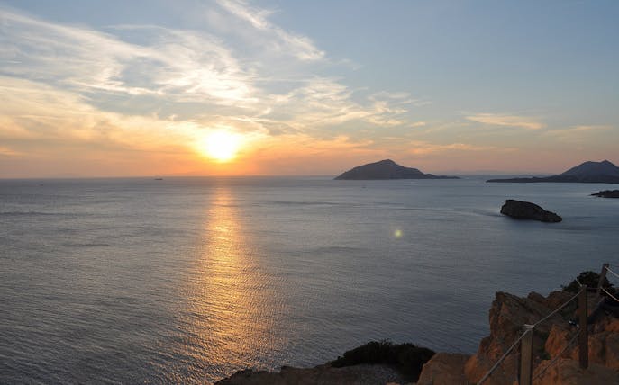 Sunset view over the Aegean Sea from Cape Sounion near the Temple of Poseidon.