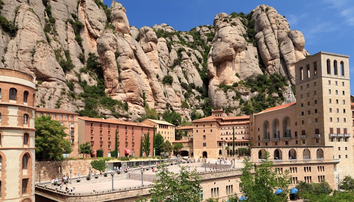 Montserrat Monastery nestled in rocky mountains, Barcelona.