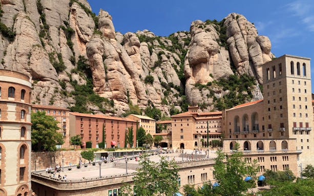 Montserrat Monastery nestled in rocky mountains, Barcelona.