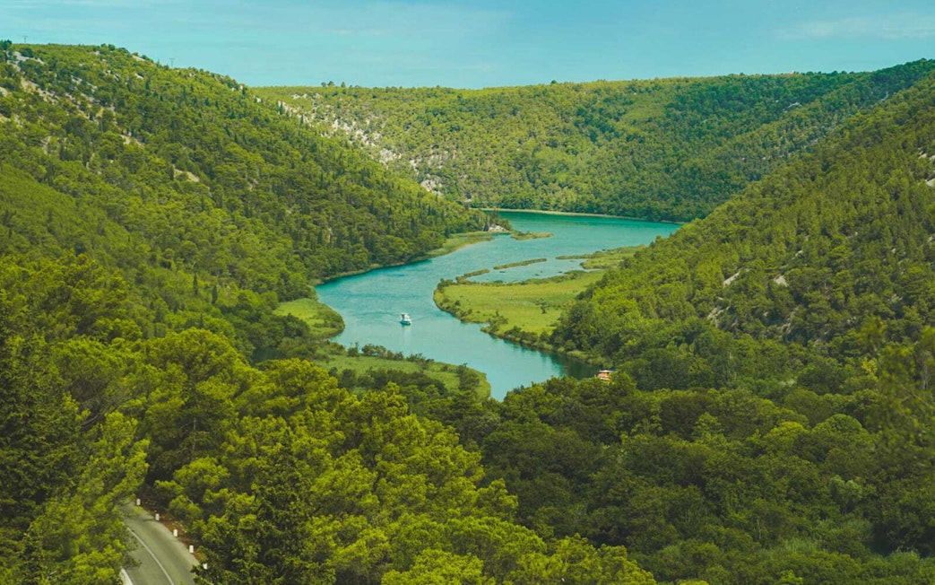 River winding through lush greenery in Krka National Park, Croatia.