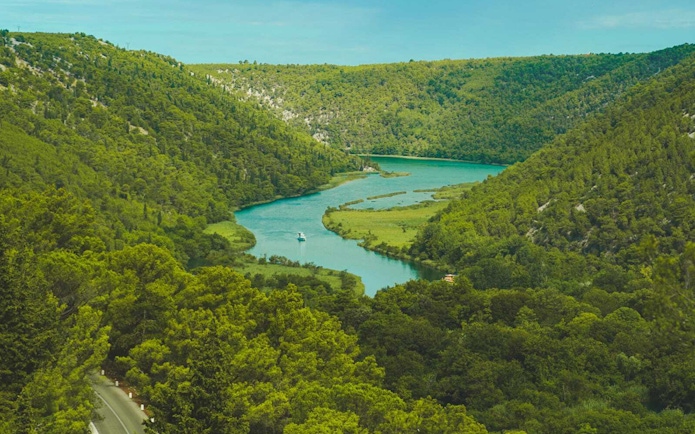 River winding through lush greenery in Krka National Park, Croatia.