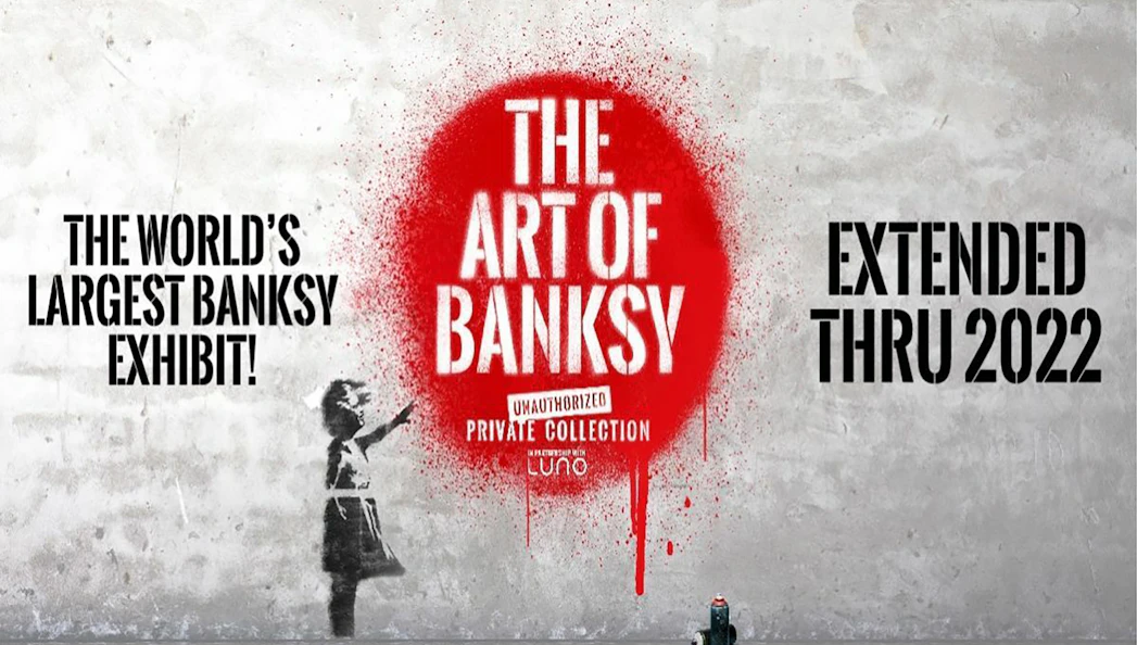 The Art of Banksy exhibit poster with red spray paint and girl stencil.