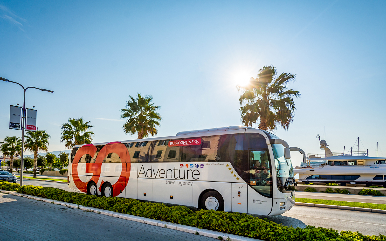 Tour bus in Split for KRKA waterfalls, swimming, and wine tasting tour.