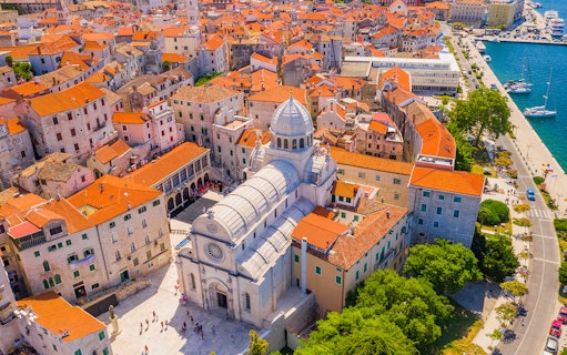 Aerial view of Šibenik's historic center with St. James Cathedral, part of the KRKA waterfalls tour from Split.
