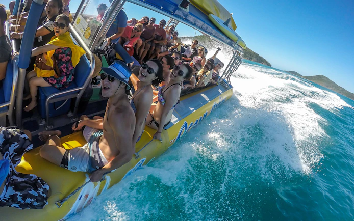 Group enjoying a speedboat ride in the Whitsundays, Australia.