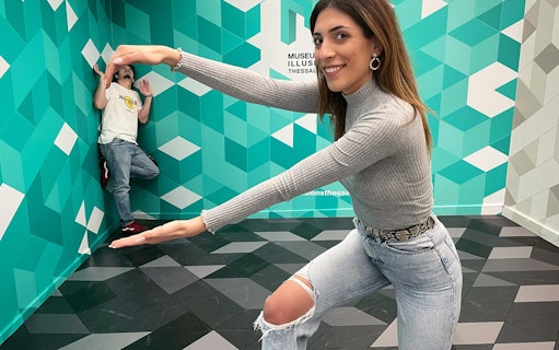 Visitors interacting with optical illusions at the Museum of Illusions Thessaloniki.