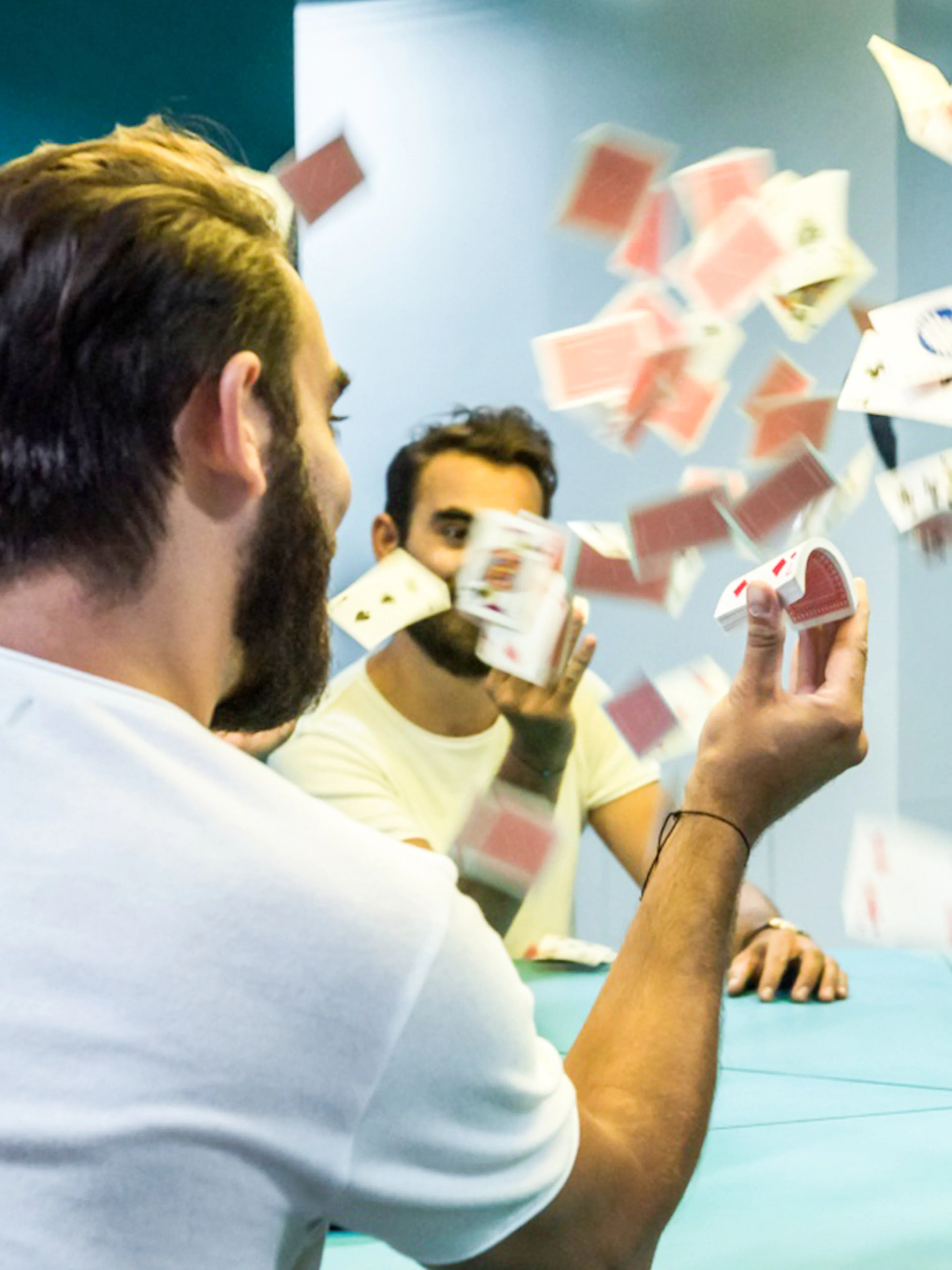 Visitors interacting with mirror illusions at the Museum of Illusions.