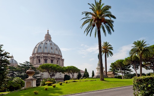 Vatican Gardens with view of St. Peter's Basilica dome, Rome.