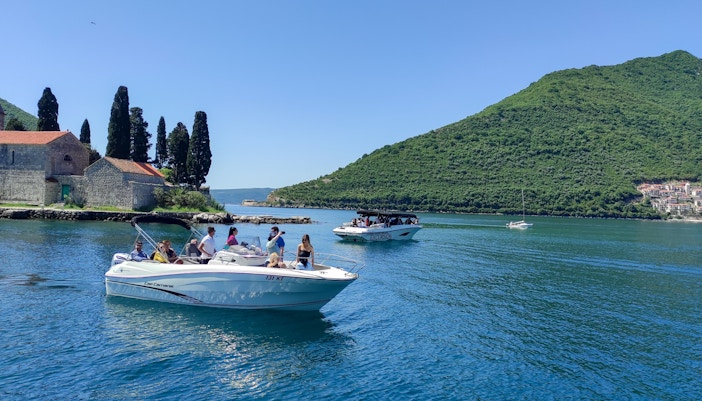 Our Lady of the Rocks island with church, Kotor Bay, speedboat tour in Montenegro.