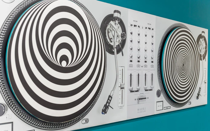 Turntable illusion exhibit at Museum of Illusions, Thessaloniki.