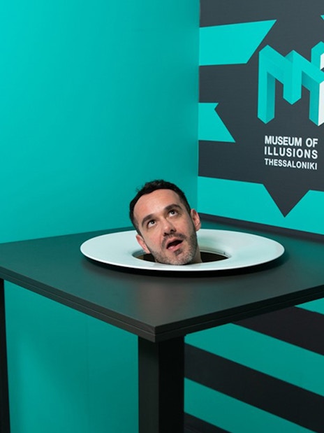 Head illusion exhibit at Museum of Illusions, Thessaloniki.