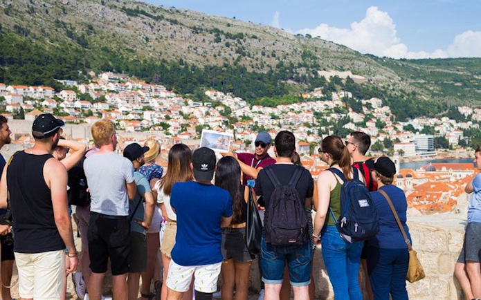 Tour group in Dubrovnik exploring Game of Thrones filming locations.