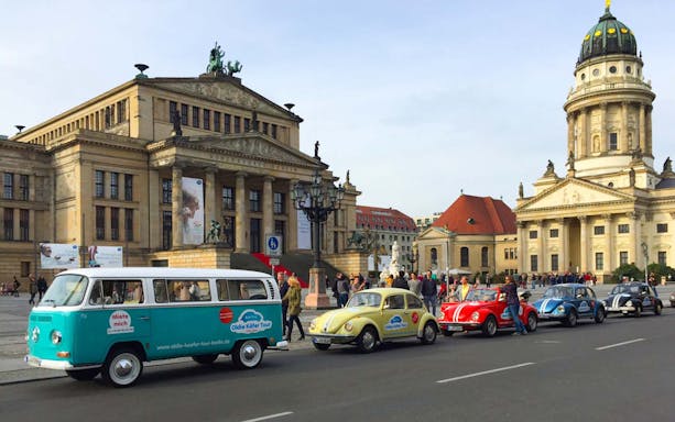 VW Käfer Cabrio tour cars in front of Konzerthaus Berlin, Germany.